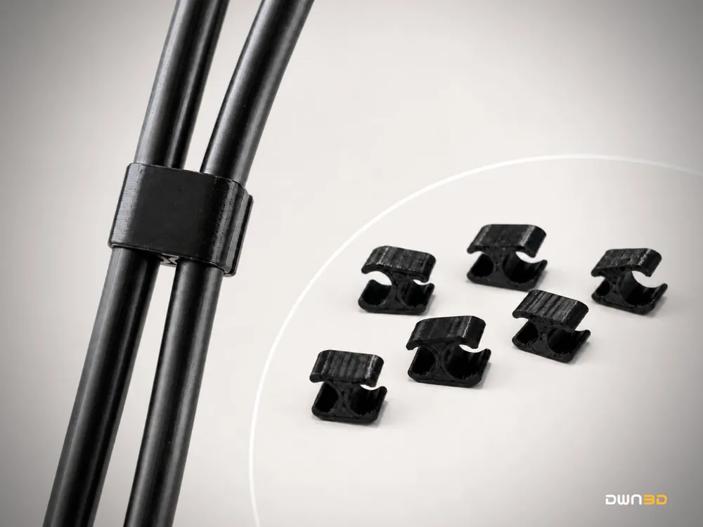 Clip o pieza de sujeción: Parametric Double Cable Clip. Referencia del modelo original.