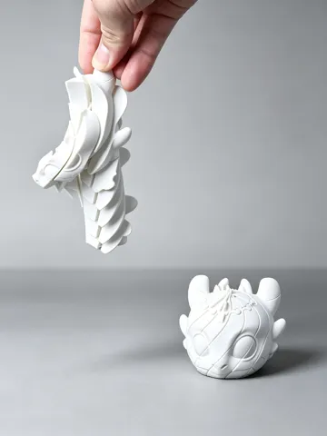 Modelo para impresión 3D: 伸缩滑溜驯龙高手无牙仔夜煞解压玩具 — vista de referencia 2