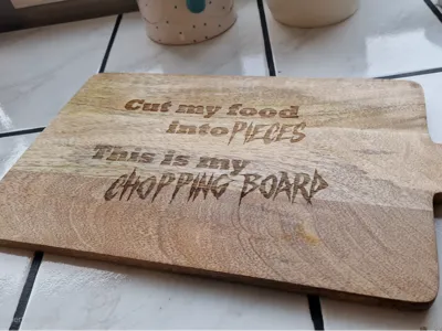 Cut my food into pieces this is my chopping board