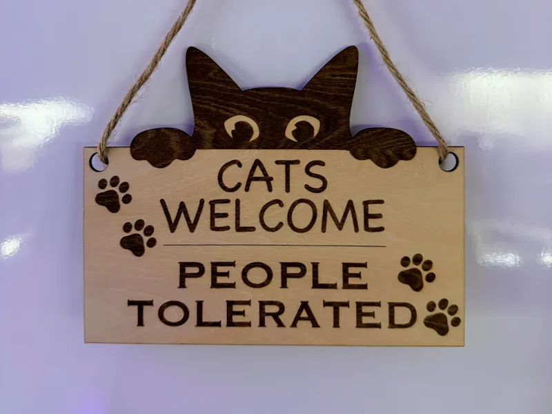 Cats welcome, people tolerated sign
