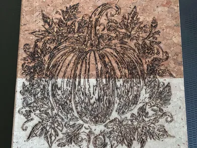 Engraved pumpkin on notebook