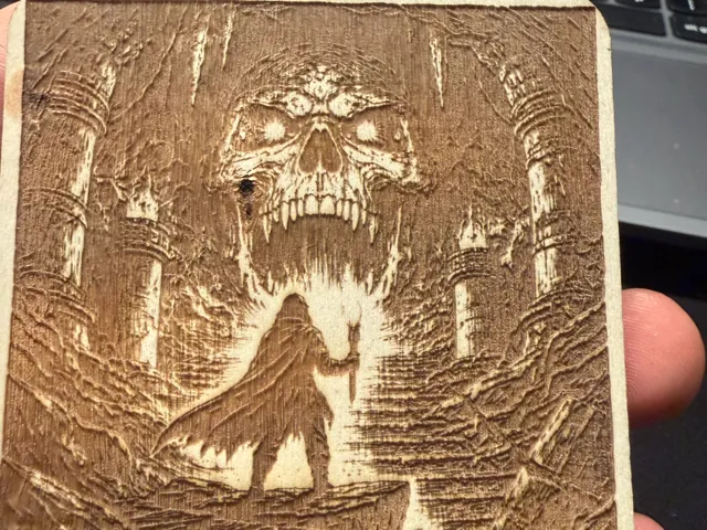 Adventurer and Skull Wood Engraving