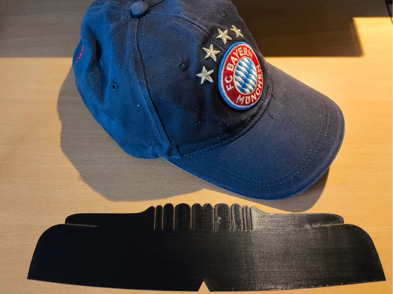 Universal cap straightener