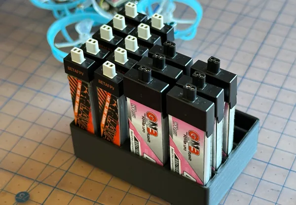 Range-batteries pour Tiny Whoop 1S