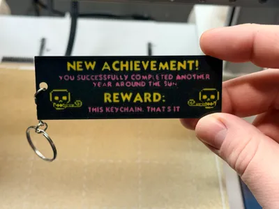 Dungeon Crawler Carl - Birthday Keychain