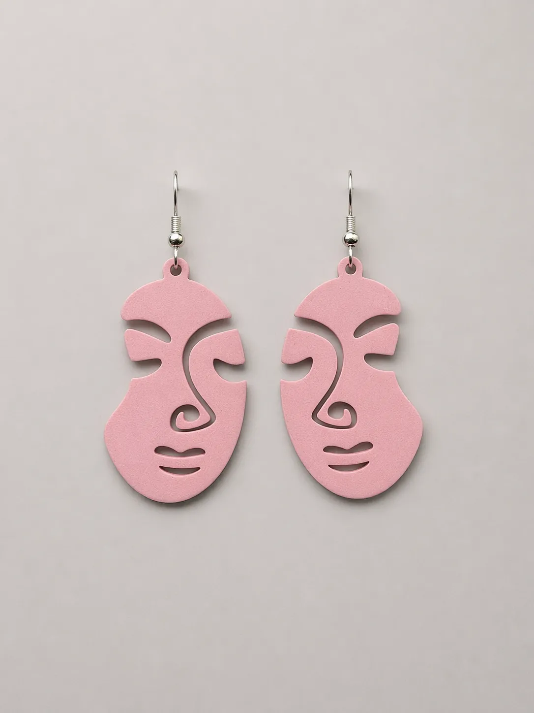 Pendientes aretes caras abstractas y minimalistas view 4