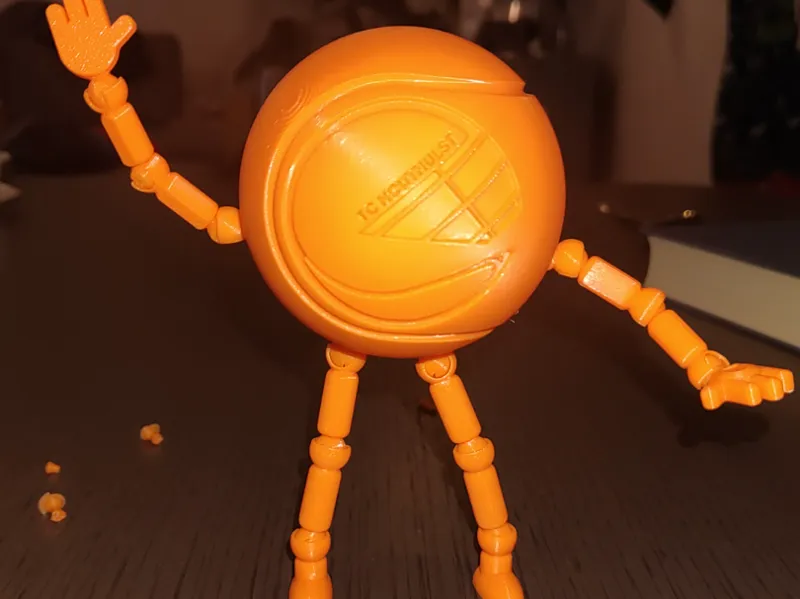 Articulated tennis ball