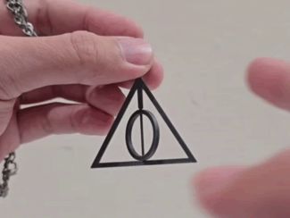 Harry Potter Deathly Hallows keychain (Rotatable)