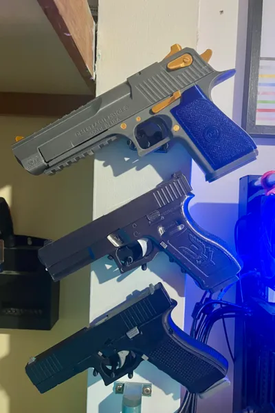 Trigger wall mount for 3D printed firearm replicas