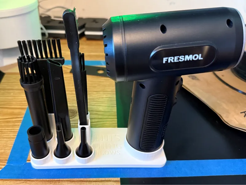 Desktop compressed air duster holder