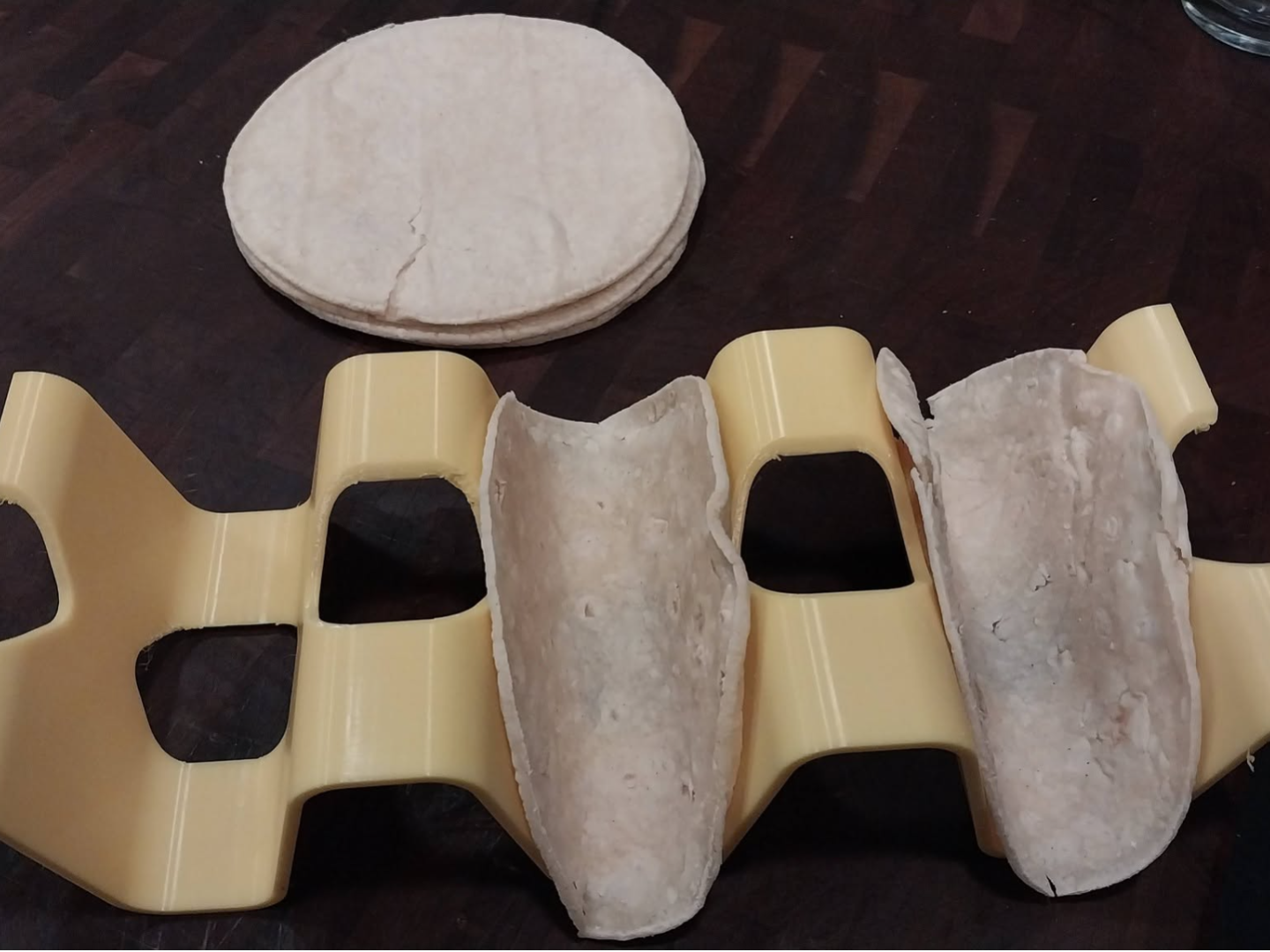 Taco holder.  Building and serving fixture.