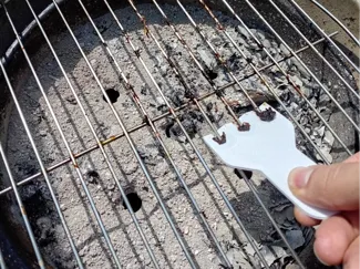 Barebecue grill scrapper