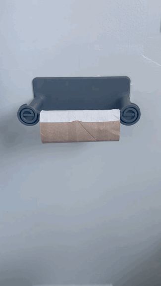 Print-in-place quick change toilet paper holder