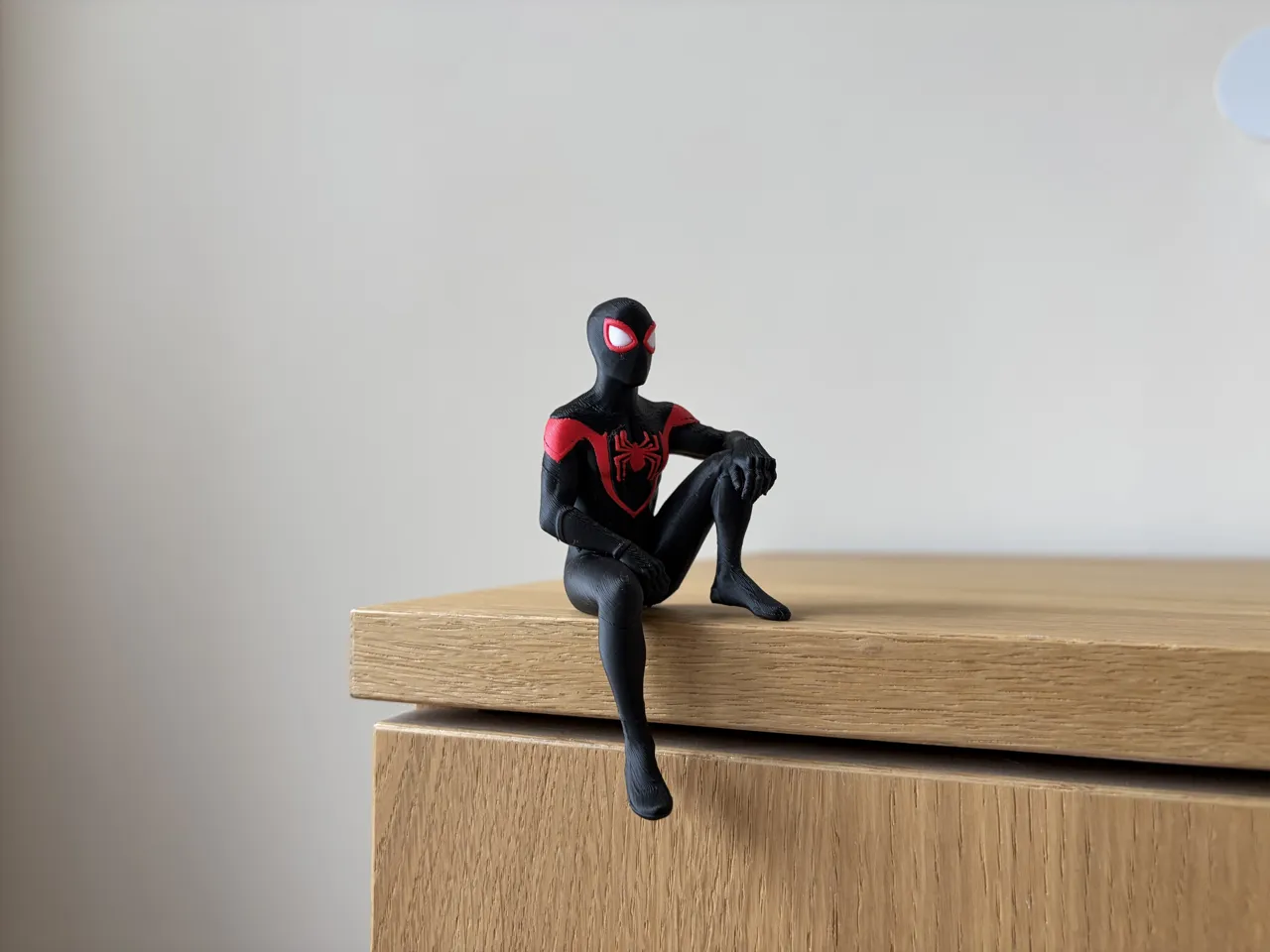 Miles Morales Sitting on Shelf Figure | Spider-Man view 4