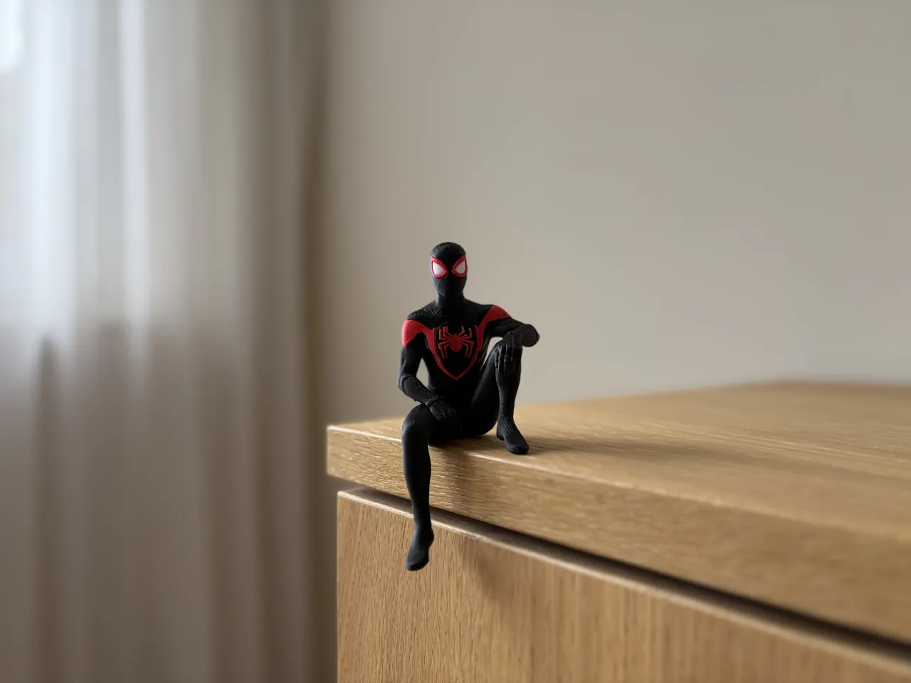 Miles Morales Sitting on Shelf Figure | Spider-Man view 3