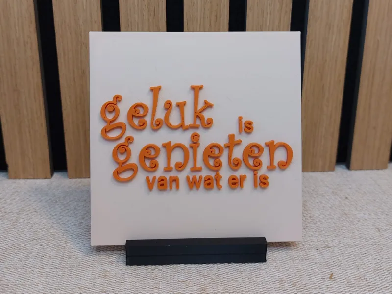 decoratieve tegel met tekst geluk is genieten