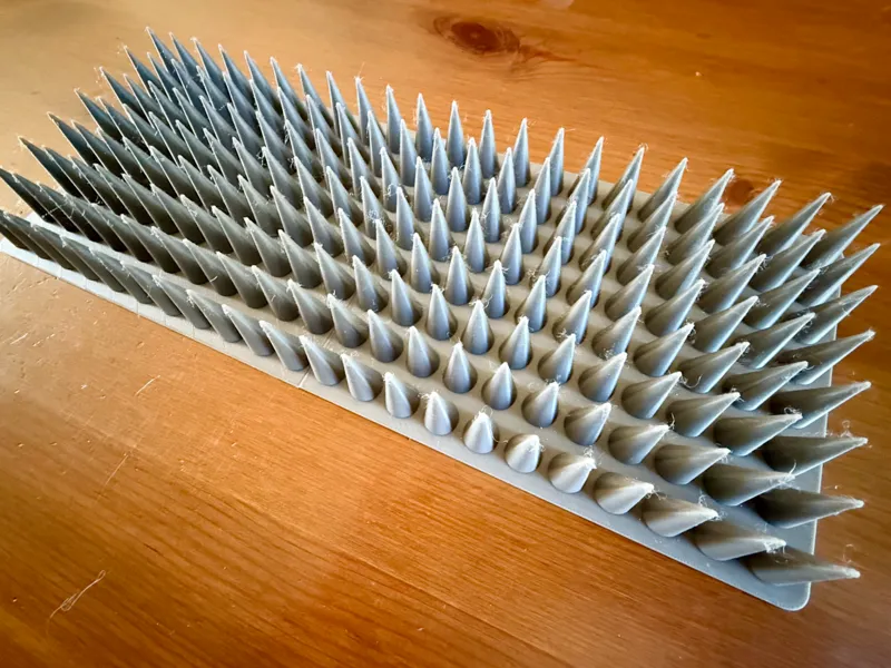 Parametric spike mat