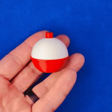 Objeto manipulable: Fishing Bobber Clicker Fidget Toy (~45 mins) — vista de referencia 4