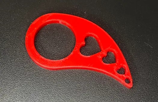 Porte-clés flipper façon karambit, motif cœur