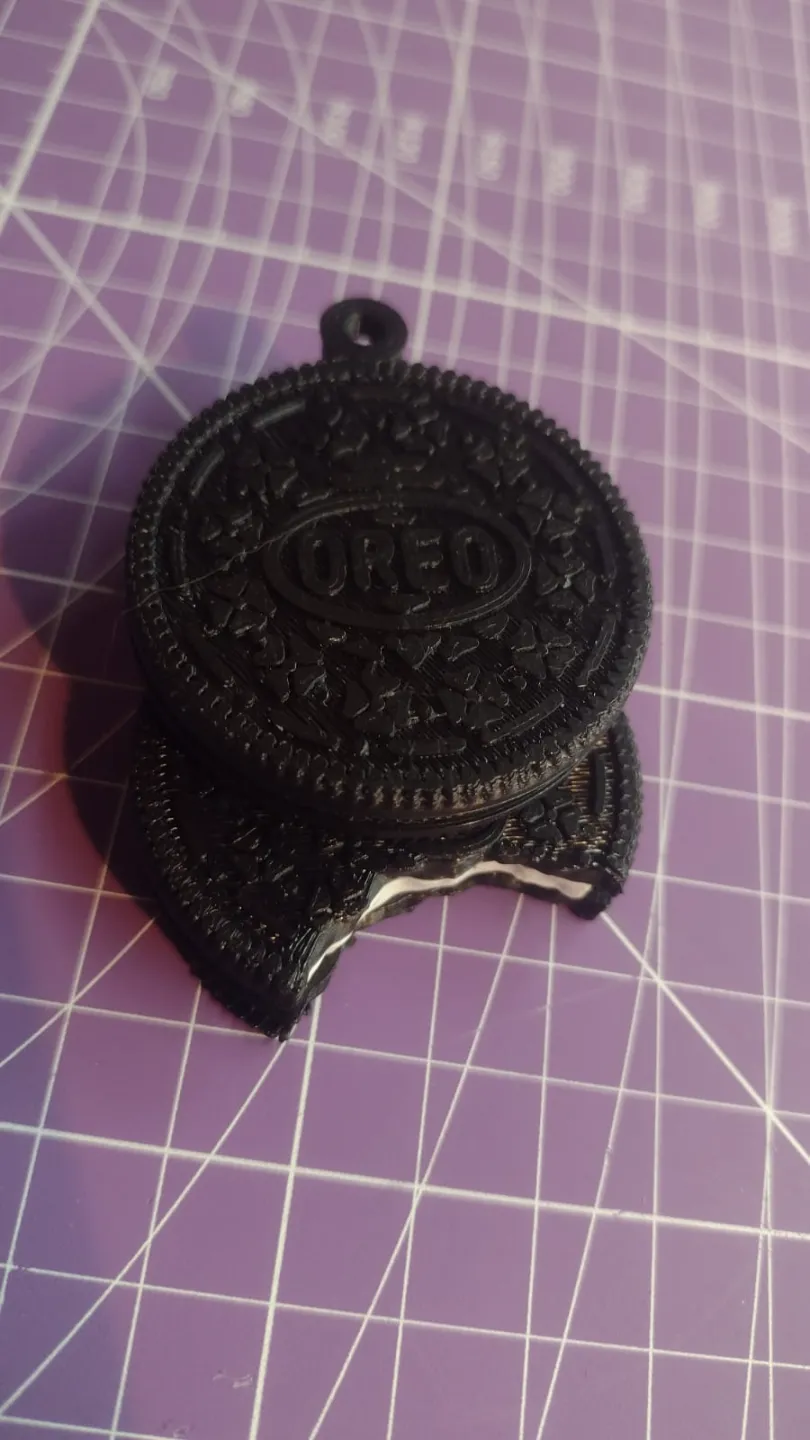 Oreo Heart keychain/earrings view 3