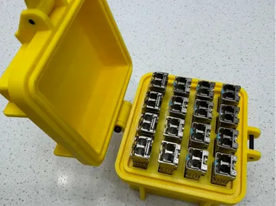 Storage box with lid for 16 optical modules