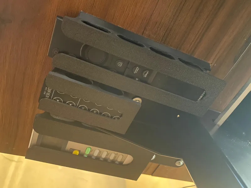 Under desk holder TV, AC or Sound remote control