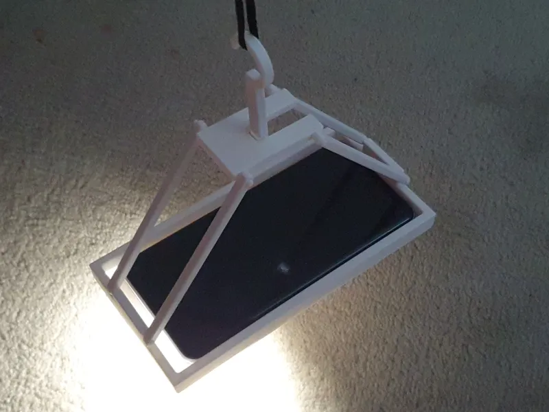 Tent phone light mount