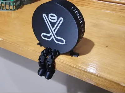 Articulated Hockey Puck Buddie