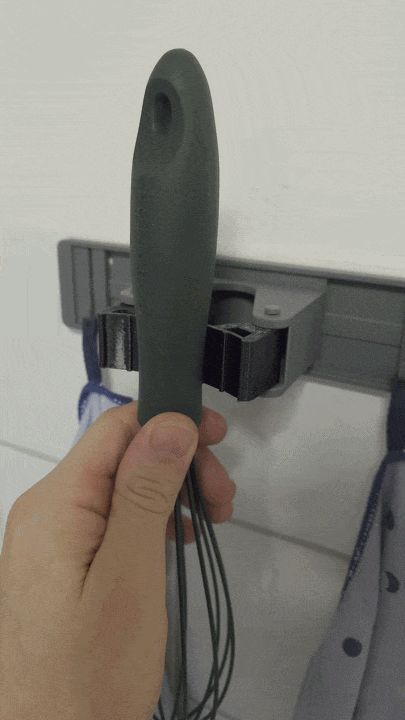 Broom handle holder