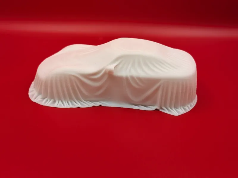Veiled Speed – Covered Sports Car Sculpture
