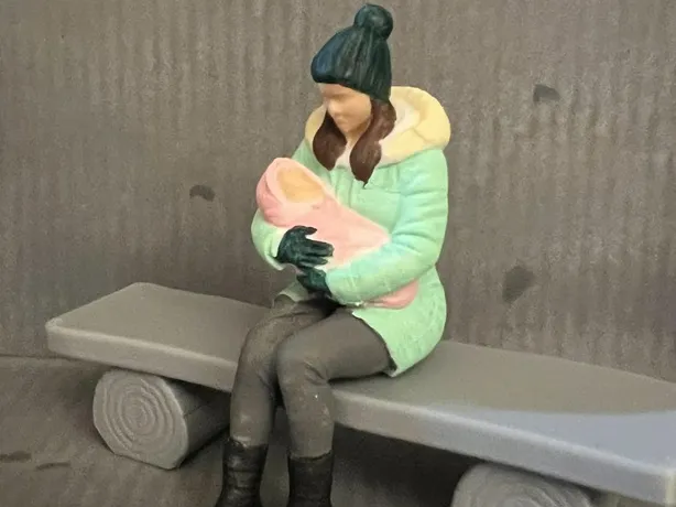 Mother and baby sitting