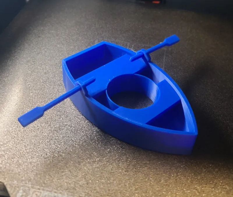 Miniature Row Boat fish feeder