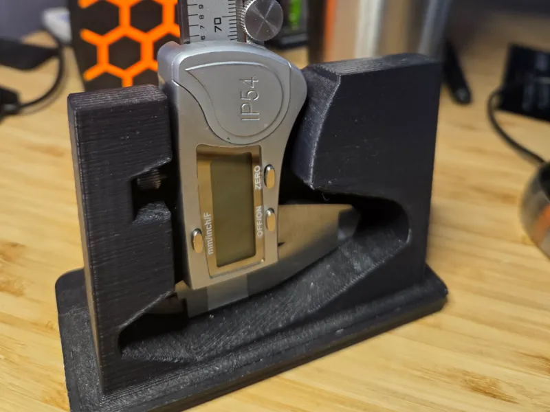 CALIPER HOLDER 