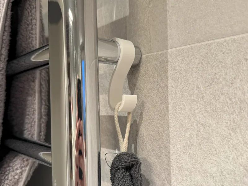 Hook for towel rail