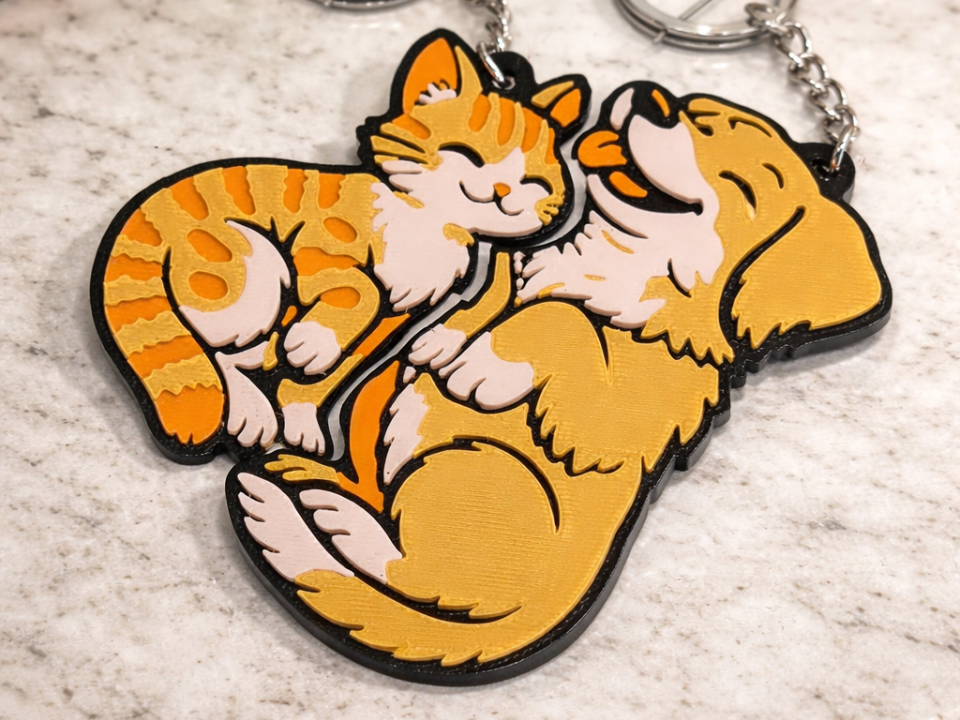 Interlocking Cat & Dog Keychain Set 