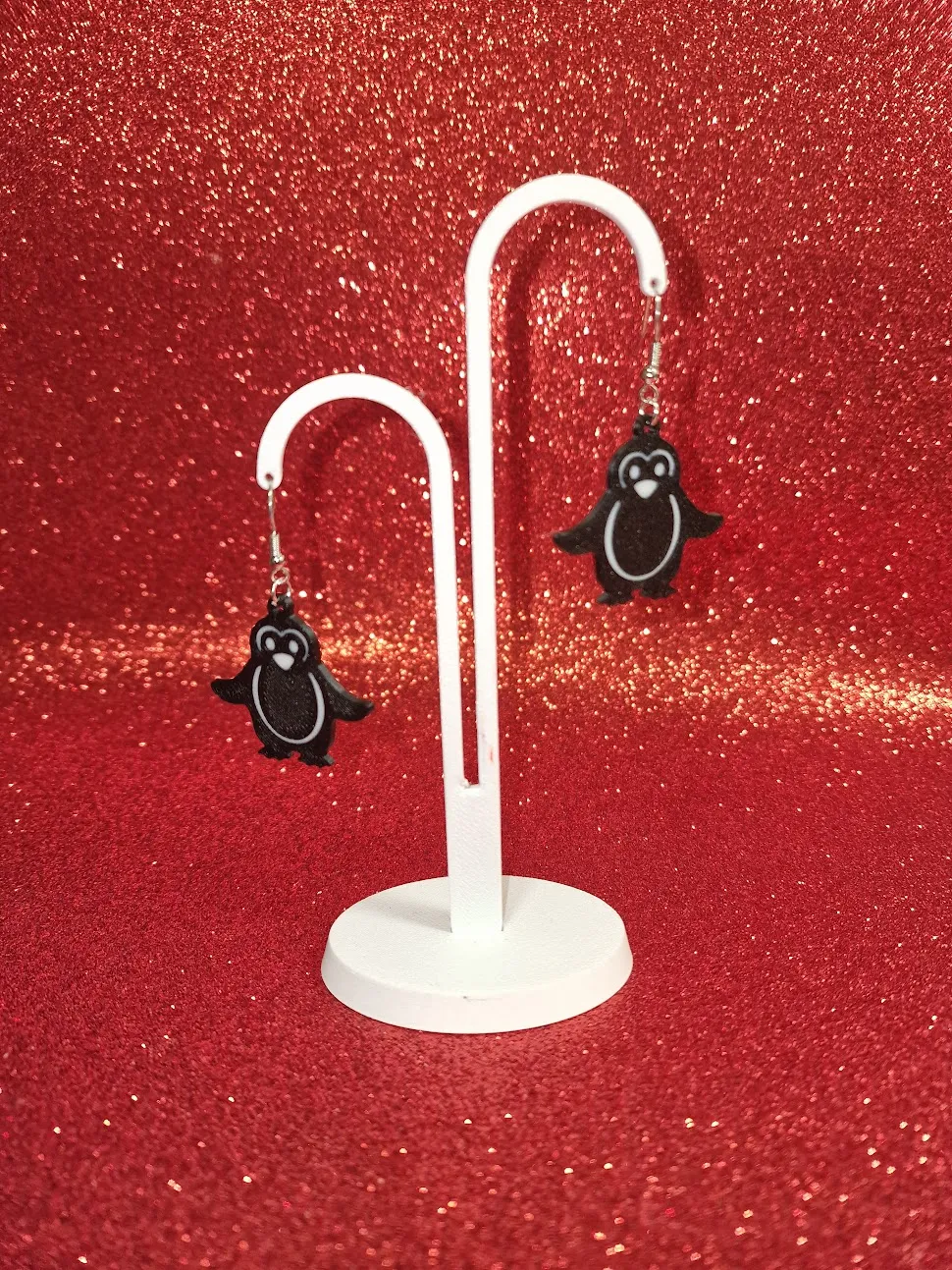 A penguin earrings view 3