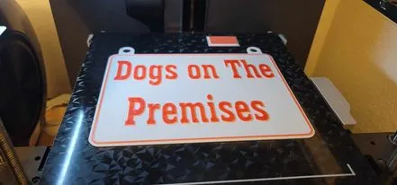 Dogs on the premises sign