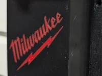 Milwaukee chainsaw mount with logo using support