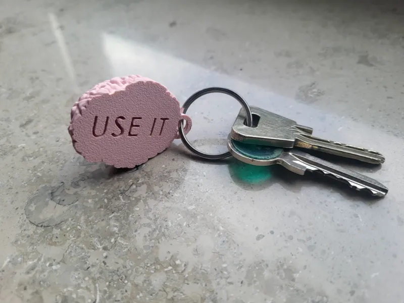 Brain "use it" keychain