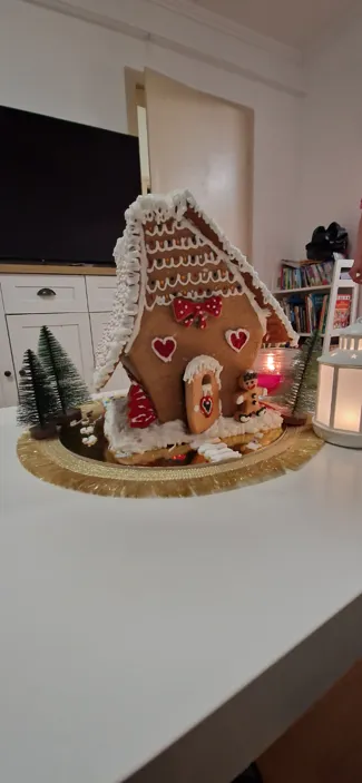 Gingerbread house cake cutting