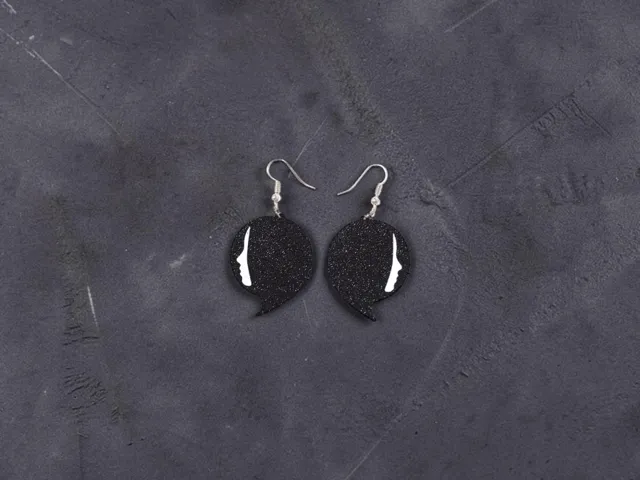 Woman face earrings