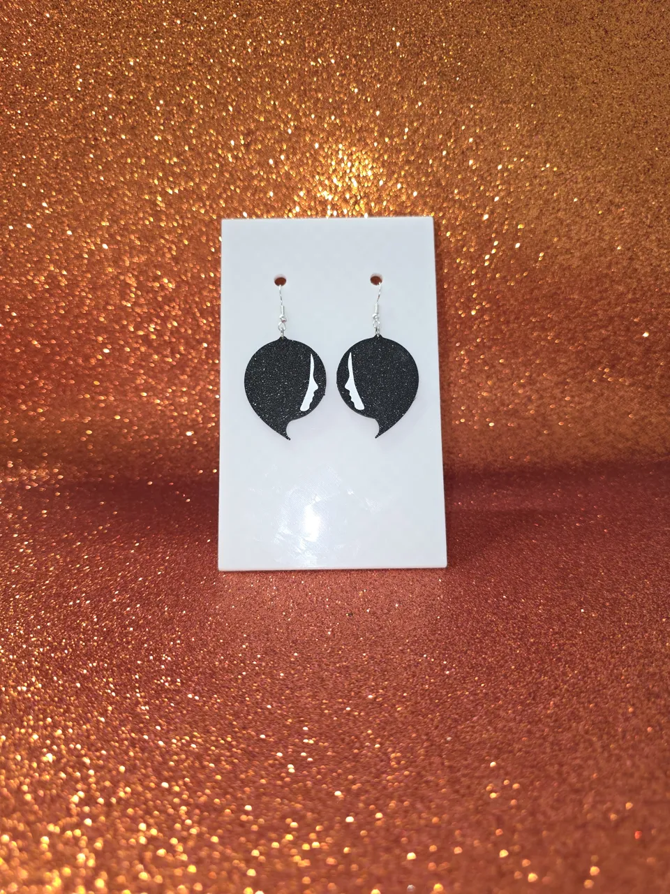 Woman face earrings view 2