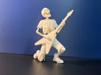 Figurine squelette guitariste — photo 2