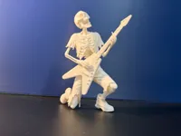 Figurine squelette guitariste — photo 1