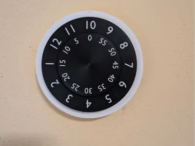 Clock with spinning clockface (AMS)