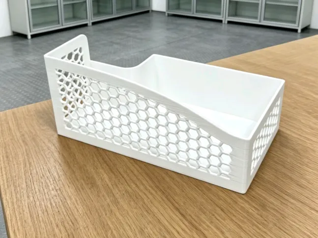 A waste collection basket with a hollow design
