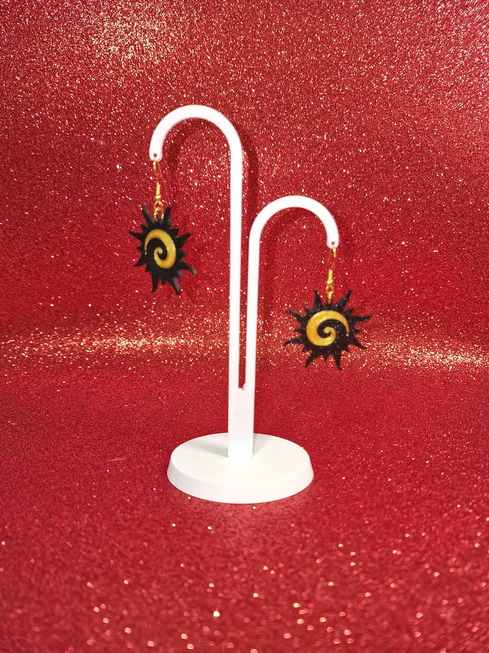 Spiral sun earrings view 3