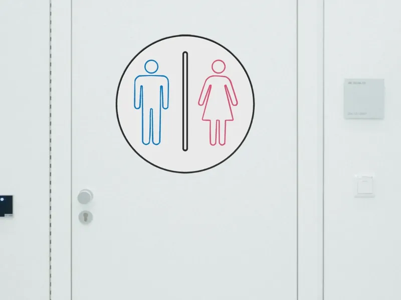 WC Toiletten Tür Schild Mann und Frau