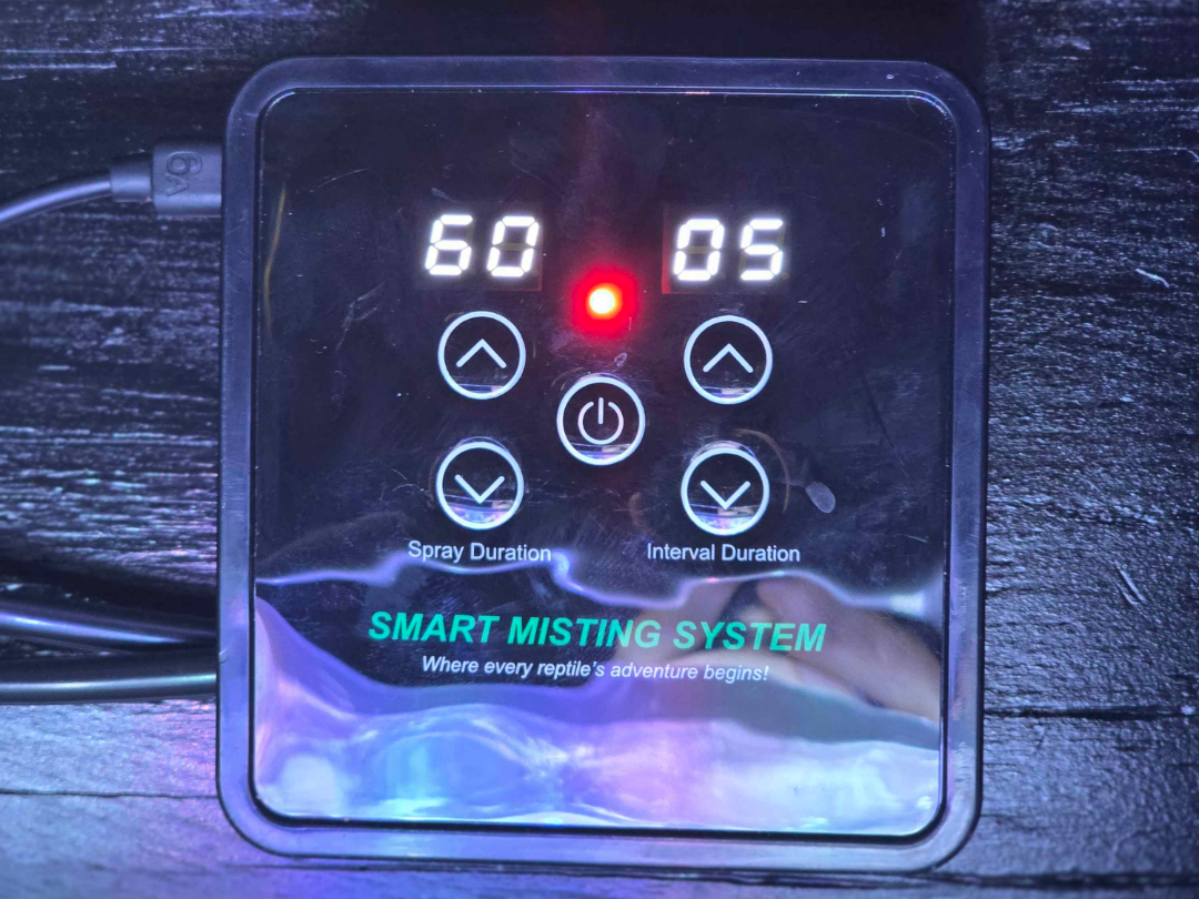 Reptile misting wall mount