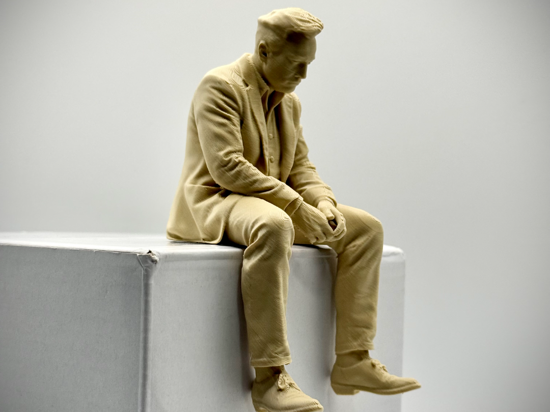 Sad Elon Musk FIgurine on a ledge ! 